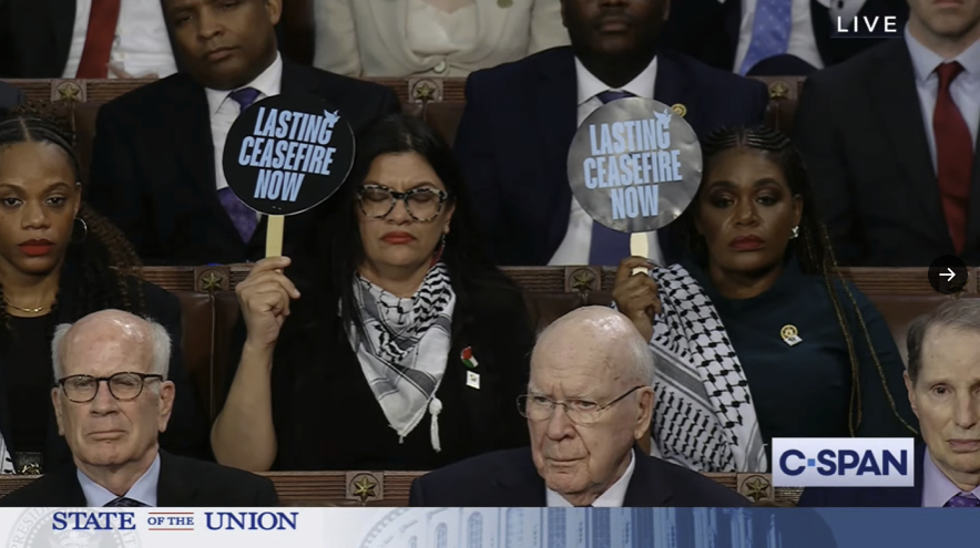 Squad Takes Center Stage: Members Sport Palestinian Keffiyehs at State of the Union 2024 While Holding Up ‘Lasting Ceasefire Now’ Signs